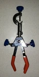 Universal Clamp - 3 Vinyl Coated Prongs, Adjustable Home Science Tools Orange. Fixed Price $14.00.