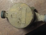 Sensus Srii 5/8" Brass Water Meter Used - Includes Cover, Readable Face. Fixed Price $23.40.