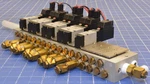040M16A / Block Manifold Koganei. Fixed Price $350.00.