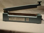 American International Electric AIE-300 Impulse Hand Sealer, 12 Inches Max.. Fixed Price $30.00.