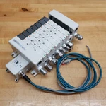 Smc Pneumatic Manifold With (1)-VV5QC41-0803TSD, (4)-4401-5, (1)-EX250-SEN1. Fixed Price $505.39.