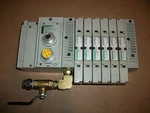 Numatics Valve Stack W/ 239-1519 & 051BBEZ2MN00061. Fixed Price $350.00.