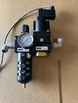 Parker #SS75-02M Soft Start Valve + #B75-02DJCG Pneumatic Filter Regulator 1/4. Fixed Price $75.00.