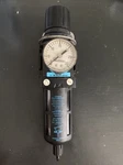 Wilkerson B18-03-FK00 Filter Regulator With Gauge 30 Psi And Mounting Bracket. Fixed Price $60.00.