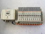 Lot Of 12 Smc Solenoid Valve SV1A00-5FU W/ Block And EX250-SDN1 Device Net. Fixed Price $265.00.