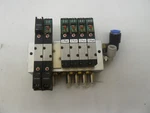 Koganei A040-4E2-34W Solenoid Valves With A040E1-34W And 040M7A Manifold. Fixed Price $169.99.